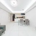 パークコート麻布鳥居坂 間接照明の柔らかな光が空間を包み込む、リビングダイニング。