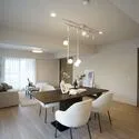 ライオンズマンション江坂町 南側・西側の2面採光を確保したLDK。風通しが良く、陽光が差し込む、明るい空間。