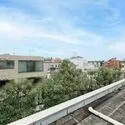 ザ・パークハウス元代々木町 最上階のルーフバルコニーから望む、開放感あふれる眺望。空と都心の街並みをお楽しみいただけます。