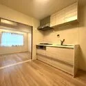 ニューハイム田町 ダイニングキッチン、洋室