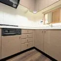 ライオンズマンション広尾南 作業スペースの広いL字型キッチン