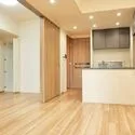 パークハウス市谷柳町 バルコニーから撮影したＬＤＫ、約５．１帖ベッドルームの引戸を解放したときの写真です