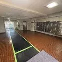 シャルム綾瀬 集合ポスト、管理人室のあるロビー