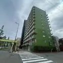三晃グリーンマンシヨン 緑のカラーが特徴的な外観です
