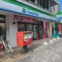日商岩井市川マンション ファミリーマート市川駅北店（コンビニ）まで約70m（徒歩1分）